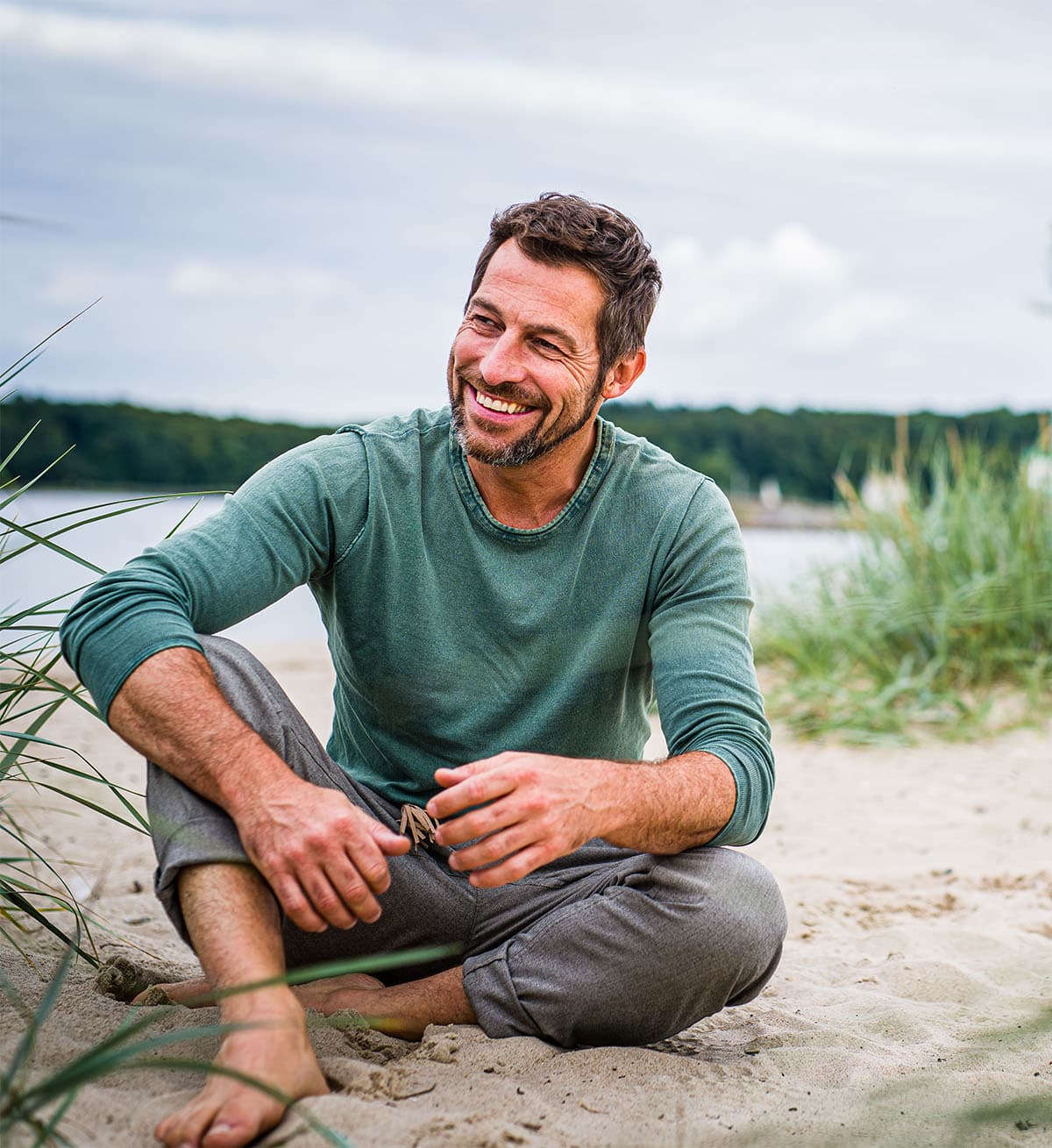 Man smiling on beach